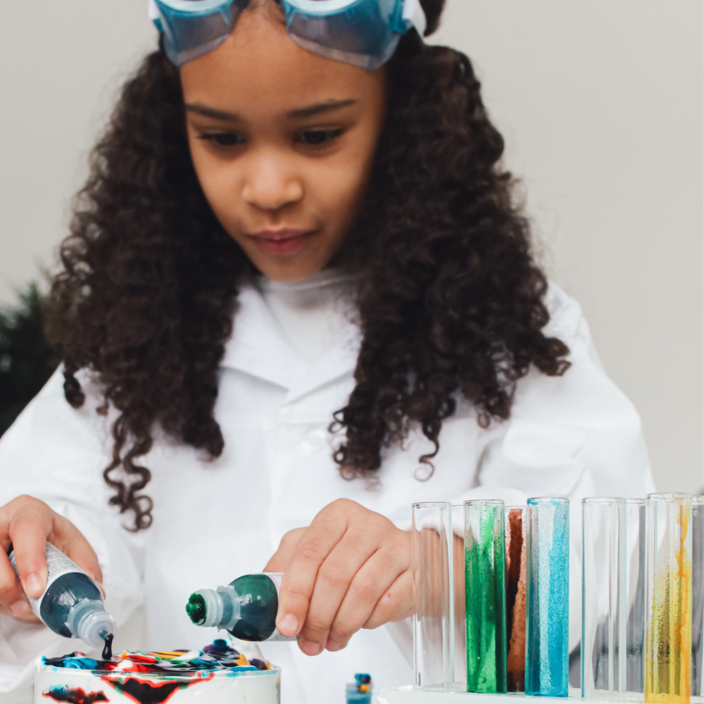 student conducting experiment without safety goggles on